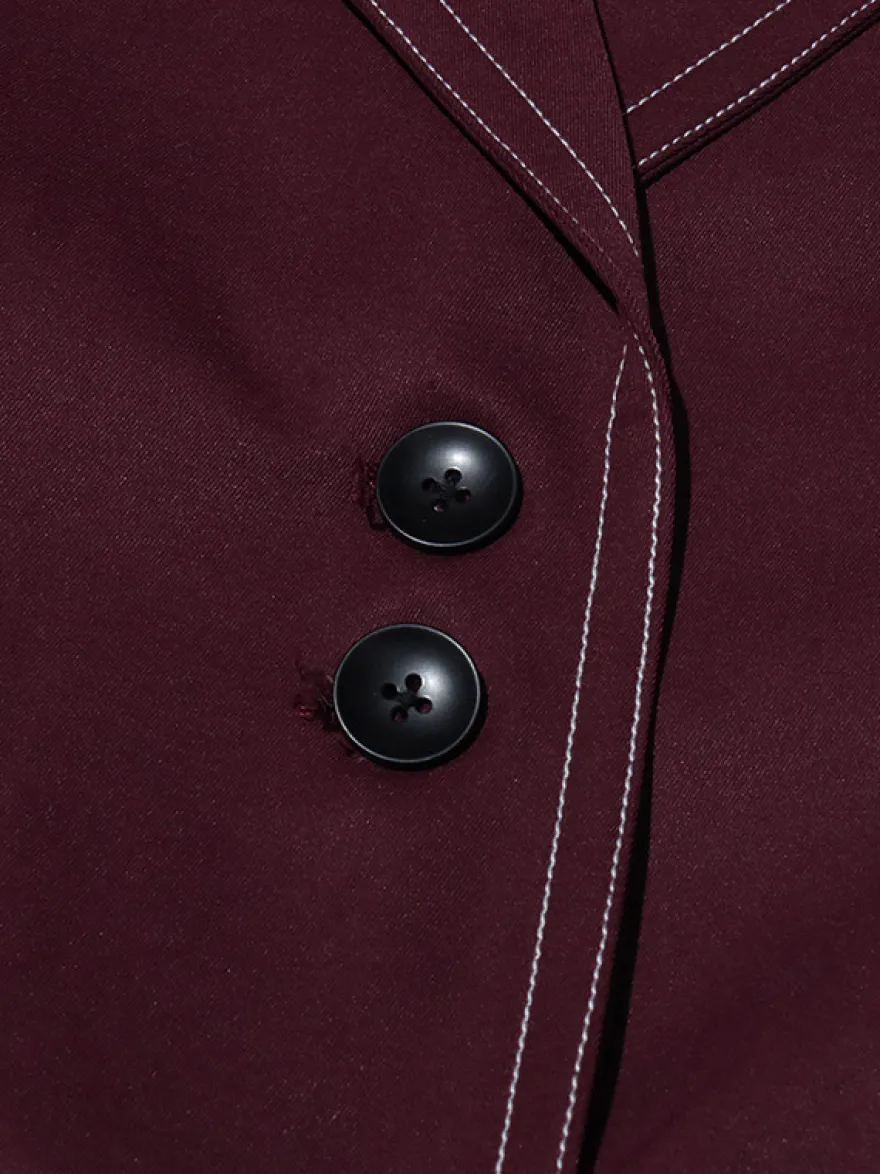 Blazer long à coutures contrastées pour femme revers cranté double boutonnage longueur maxi