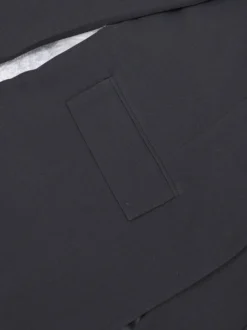 Blazer long à devant ouvert pour femme coupe ample et décontractée avec revers. Veste de tailleur noire décontractée.