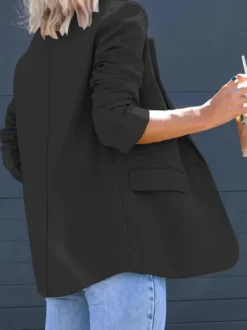 Blazer long à devant ouvert pour femme coupe ample et décontractée avec revers. Veste de tailleur noire décontractée.