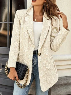 Blazer oversize pour femme en jacquard à motif floral en relief col à revers et un seul bouton coupe ample.