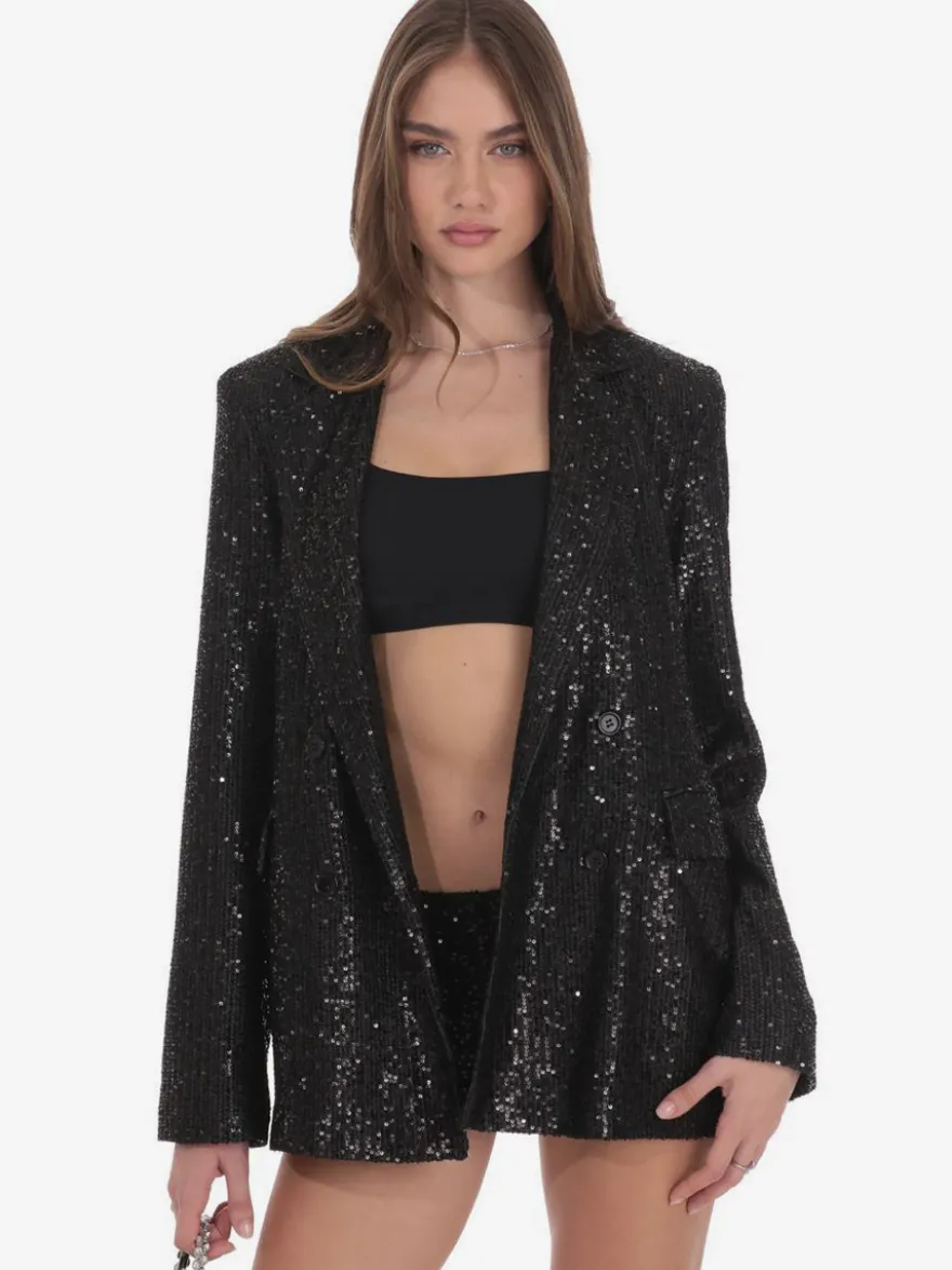 Blazer à sequins croisé pour femme coupe oversize idéal pour les soirées et les clubs noir et argent.