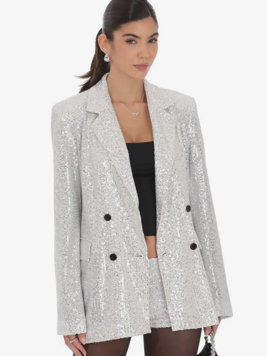 Blazer à sequins croisé pour femme coupe oversize idéal pour les soirées et les clubs noir et argent.