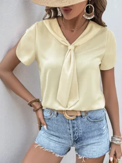 Blouse pour femme abricot col en V manches courtes style décontracté idéale pour l'été