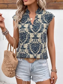 Blouse pour femme bleu foncé imprimée à col montant chic sans manches