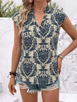 Blouse pour femme bleu foncé imprimée à col montant chic sans manches