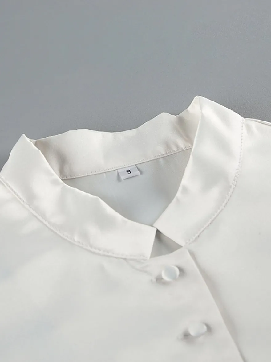 Blouse pour femme boutons dorés col montant manches longues chics