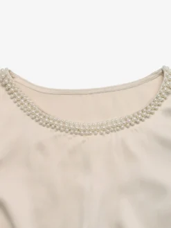 Body à manches courtes et col rond en satin de soie brillant champagne avec bordure en perles