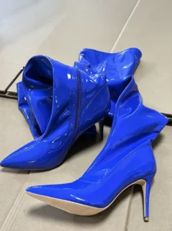 Bottes cuissardes bleues à bout pointu et talons hauts élastiques