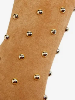Bottes cuissardes en daim à bout pointu et talons hauts perlés