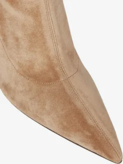 Bottes cuissardes en daim à talons hauts et bout pointu