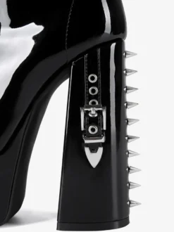 Bottes noires hautes à plateforme et boucle lacets et talons épais