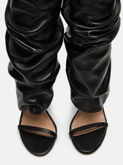 Bottes noires à talons hauts et bout ouvert pour femme