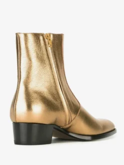 Bottines Chelsea pour homme en cuir véritable doré à talon épais et bout rond bottines courtes à la finition brillante.