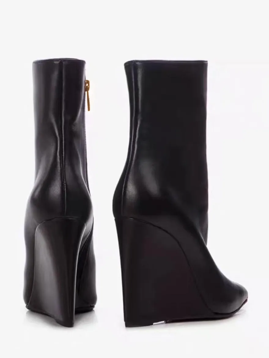 Bottines compensées noires à bout pointu et fermeture éclair pour femmes