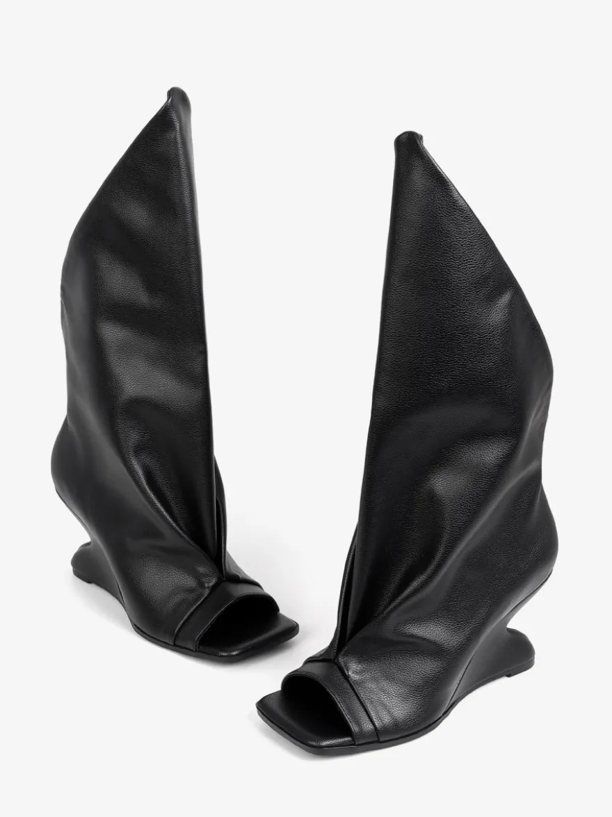 Bottines noires à bout ouvert et talon compensé