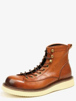 Bottines noires à bout rond en cuir véritable style Chukka vintage à lacets.