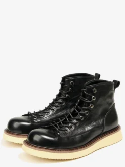 Bottines noires à bout rond en cuir véritable style Chukka vintage à lacets.
