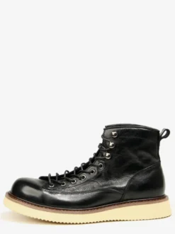 Bottines noires à bout rond en cuir véritable style Chukka vintage à lacets.