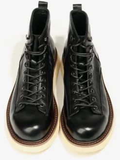 Bottines noires à bout rond en cuir véritable style Chukka vintage à lacets.