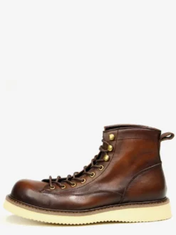 Bottines noires à bout rond en cuir véritable style Chukka vintage à lacets.