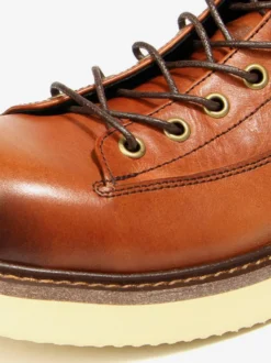 Bottines noires à bout rond en cuir véritable style Chukka vintage à lacets.