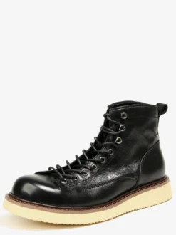 Bottines noires à bout rond en cuir véritable style Chukka vintage à lacets.