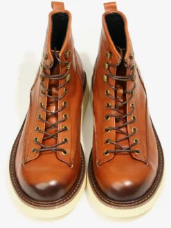 Bottines noires à bout rond en cuir véritable style Chukka vintage à lacets.