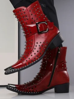 Bottines noires pour homme bout pointu rivets et boucle.