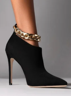 Bottines noires à talons hauts et détails chaîne talons aiguilles