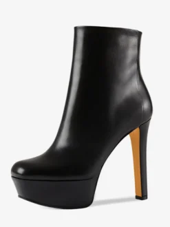Bottines à plateforme noires et à talons hauts et bout rond
