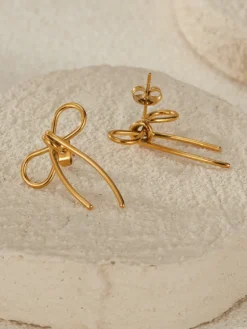 Boucles d'oreilles à tige en or avec nœud papillon pour femme 2026