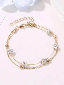 Bracelet de cheville en perles de cristal et base en métal
