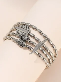 Bracelet de cheville plaqué avec pendentif plume d'inspiration bohème