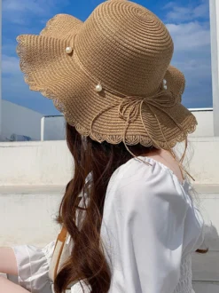 Chapeau de paille à large bord pour femme protection solaire idéal pour la plage collection été 2026