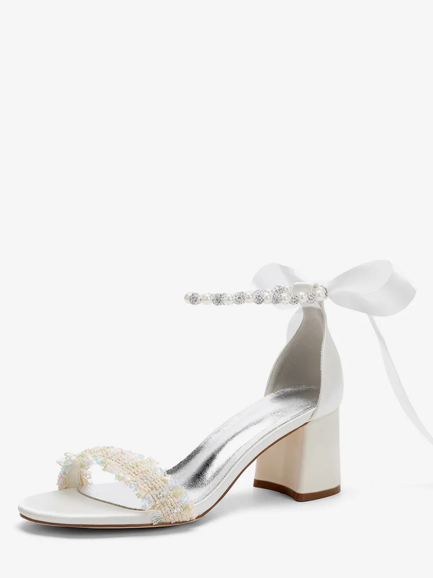 Chaussures de mariée blanches à talon compensé et strass bride cheville