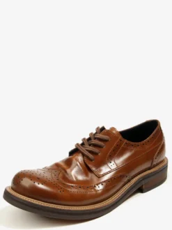 Chaussures de ville pour hommes style brogue bout rond lacets en cuir véritable.