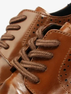 Chaussures de ville pour hommes style brogue bout rond lacets en cuir véritable.