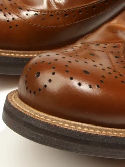 Chaussures de ville pour hommes style brogue bout rond lacets en cuir véritable.
