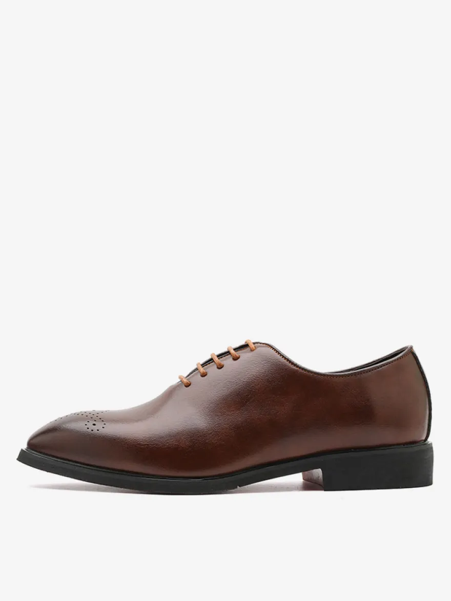 Chaussures Oxford marron pour hommes bout rond à lacets.