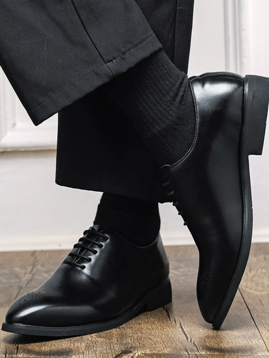 Chaussures Oxford marron pour hommes bout rond à lacets.