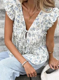 Chemise pour femme bleue à col en V sans manches lacée style décontracté