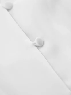 Chemisier péplum blanc élégant pour femme - Col V dos nu manches lanternes coupe ajustée - Idéal pour le printemps et le soir (2026)