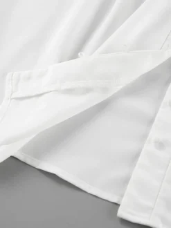 Chemisier vintage à manches bouffantes et col montant pour femme collection automne 2026