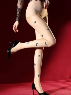 Collants noirs brillants transparents à imprimé papillon