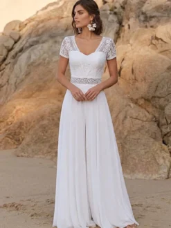 Combinaison de mariée en dentelle combinaison longue en dentelle décolleté travaillé manches courtes taille naturelle couleur ivoire