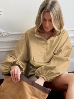 Coupe-vent à demi-zip col montant manches bouffantes oversize et ourlet élastique