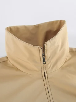 Coupe-vent à demi-zip col montant manches bouffantes oversize et ourlet élastique
