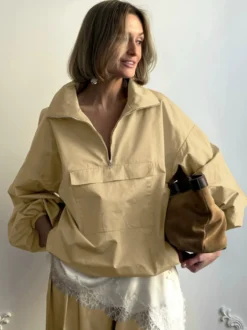 Coupe-vent à demi-zip col montant manches bouffantes oversize et ourlet élastique
