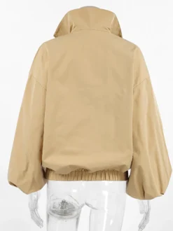 Coupe-vent à demi-zip col montant manches bouffantes oversize et ourlet élastique