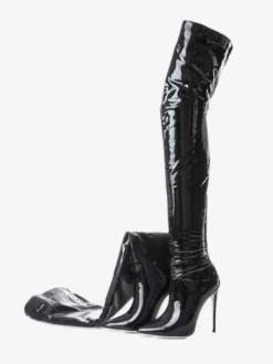 Cuissardes noires pour femmes en cuir verni brillant à bout pointu et talon aiguille au-dessus du genou